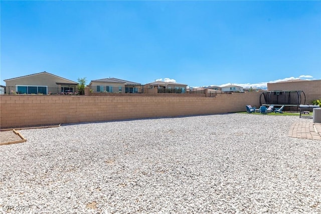 8929 Cassia Winds St, Las Vegas, NV 89166 - fenced backyard featuring a patio