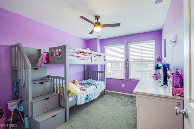 bedroom featuring carpet, baseboards, and a ceiling fan