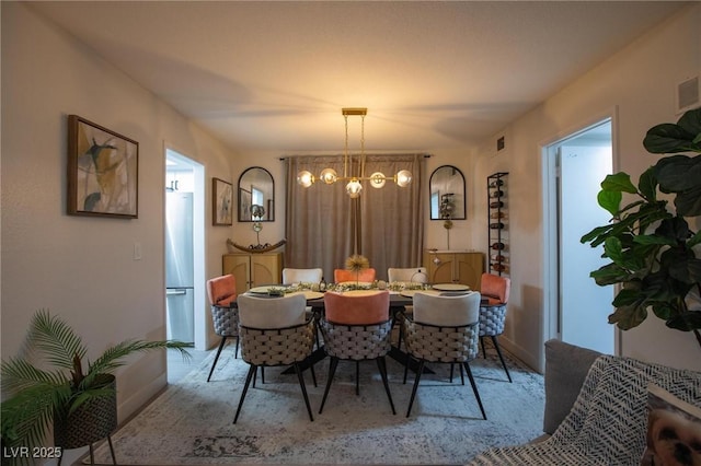 9013 Cypress Point Way, Las Vegas, NV 89117 - dining area with a chandelier
