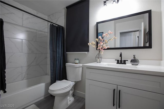 9013 Cypress Point Way, Las Vegas, NV 89117 - bathroom with toilet, vanity, wood finished floors, shower / tub combo, and baseboards