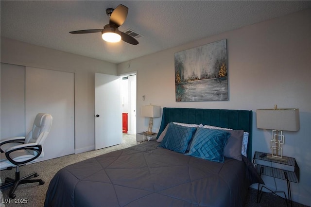 9013 Cypress Point Way, Las Vegas, NV 89117 - carpeted bedroom featuring a closet, ceiling fan, and a textured ceiling