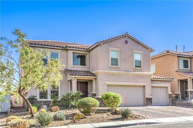 1213 High Altitude Ave, North Las Vegas, NV 89032 - view of front of house featuring a tiled roof, stucco siding, stone siding, and driveway