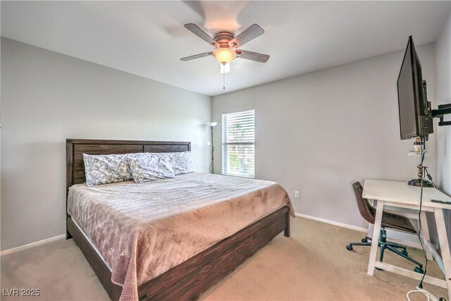 1213 High Altitude Ave, North Las Vegas, NV 89032 - bedroom featuring light carpet, baseboards, an office area, and a ceiling fan
