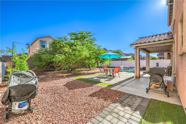 1213 High Altitude Ave, North Las Vegas, NV 89032 - fenced backyard featuring a patio area