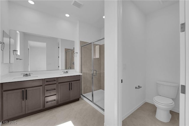 full bathroom featuring a shower stall, toilet, tile patterned flooring, double vanity, and recessed lighting