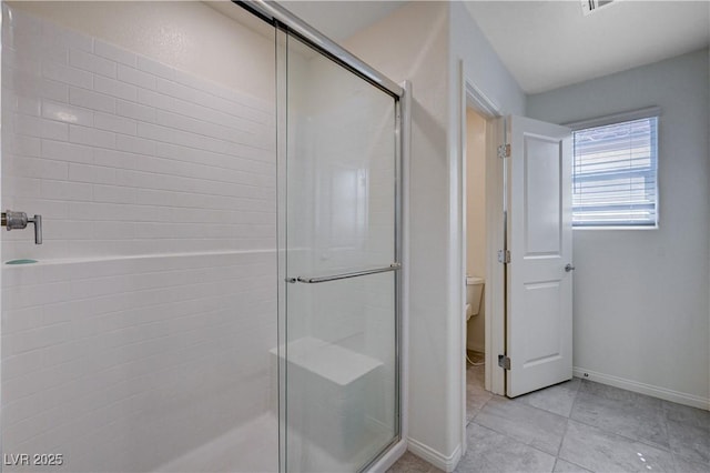 387 Larksong Ave, Henderson, NV 89011 - bathroom with a stall shower, toilet, and tile patterned flooring