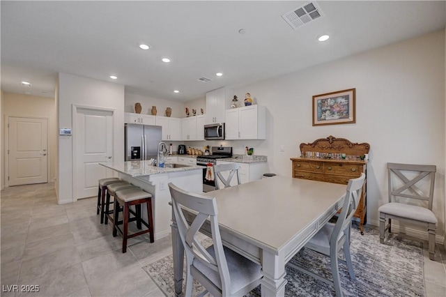 387 Larksong Ave, Henderson, NV 89011 - dining room featuring recessed lighting and light tile patterned floors