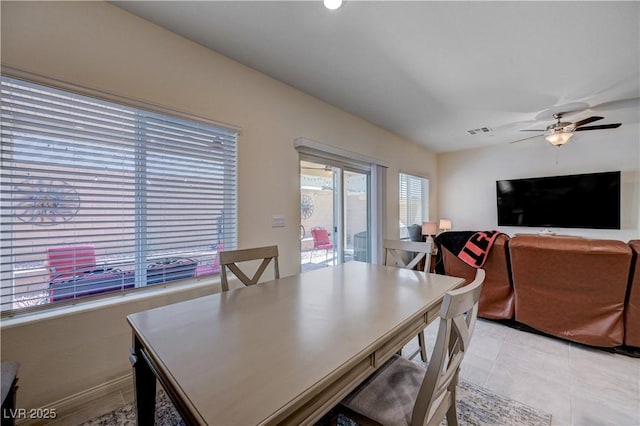 387 Larksong Ave, Henderson, NV 89011 - dining space with ceiling fan and light tile patterned floors