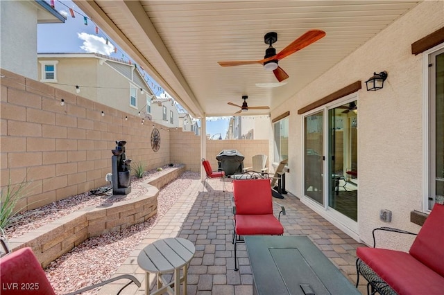 387 Larksong Ave, Henderson, NV 89011 - fenced backyard featuring a patio area and a ceiling fan