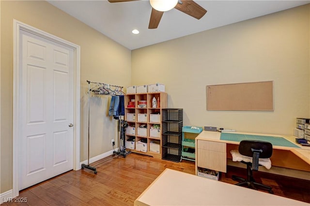 home office featuring ceiling fan, wood finished floors, baseboards, and recessed lighting