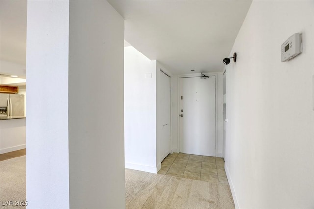 3930 University Center Dr Unit 311, Las Vegas, NV 89119 - hallway with light colored carpet and baseboards