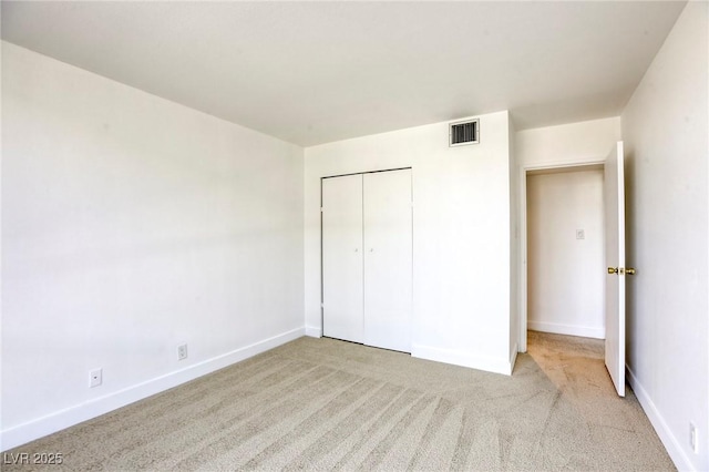 3930 University Center Dr Unit 311, Las Vegas, NV 89119 - unfurnished bedroom featuring carpet, baseboards, and a closet