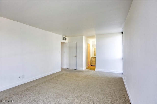 3930 University Center Dr Unit 311, Las Vegas, NV 89119 - unfurnished room featuring light carpet and baseboards