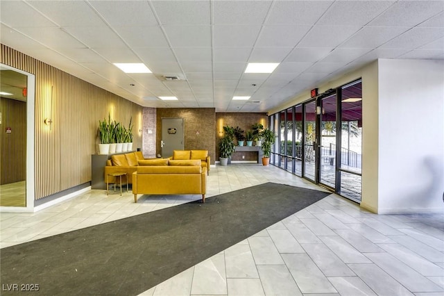 3930 University Center Dr Unit 311, Las Vegas, NV 89119 - common area featuring wooden walls and a paneled ceiling