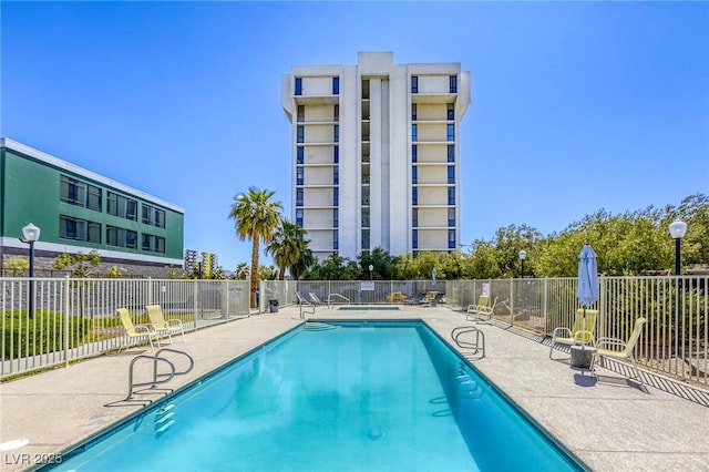 3930 University Center Dr Unit 311, Las Vegas, NV 89119 - community pool with fence and a patio area