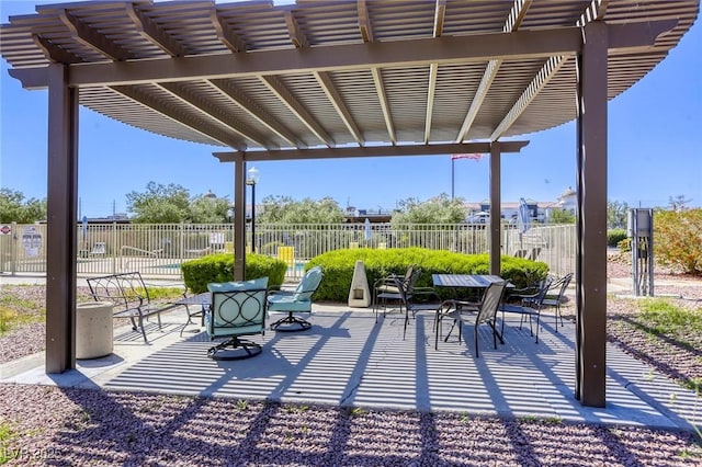 3930 University Center Dr Unit 312, Las Vegas, NV 89119 - view of patio with a pergola and fence