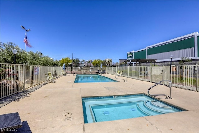 3930 University Center Dr Unit 312, Las Vegas, NV 89119 - community pool featuring a patio and fence