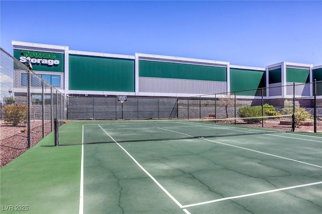 3930 University Center Dr Unit 312, Las Vegas, NV 89119 - view of tennis court with fence and community basketball court