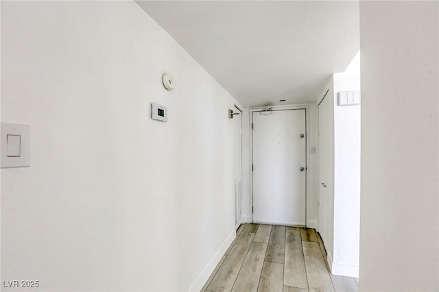 3930 University Center Dr Unit 312, Las Vegas, NV 89119 - corridor with light wood-type flooring and baseboards