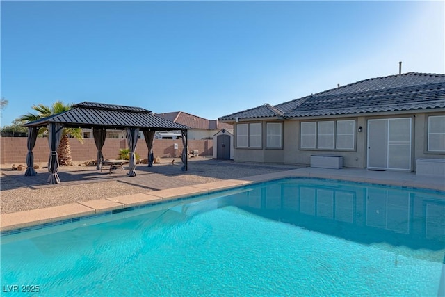 8228 Fulton Ranch St, Las Vegas, NV 89131 - view of pool with a gazebo, a shed, a fenced backyard, and a patio