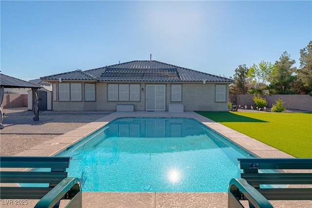 view of swimming pool featuring a fenced backyard, a patio, and a gazebo