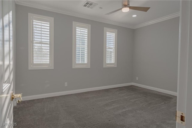 carpeted spare room featuring ornamental molding, baseboards, a ceiling fan, healthy amount of natural light, and recessed lighting