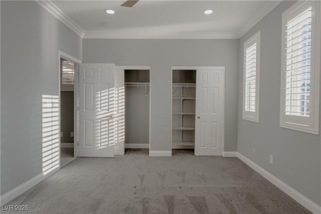 8228 Fulton Ranch St, Las Vegas, NV 89131 - unfurnished bedroom with crown molding, carpet floors, two closets, and recessed lighting