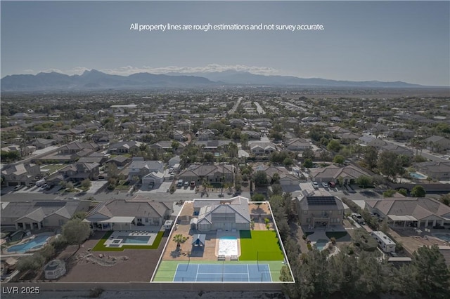 aerial view of residential area featuring property boundaries highlighted and mountains