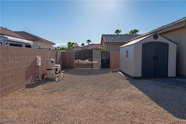 8228 Fulton Ranch St, Las Vegas, NV 89131 - view of yard featuring a gate and a shed
