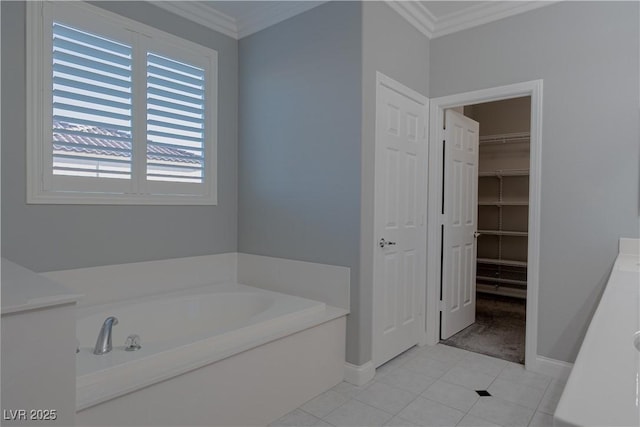 8228 Fulton Ranch St, Las Vegas, NV 89131 - bathroom with a garden tub, ornamental molding, and tile patterned flooring