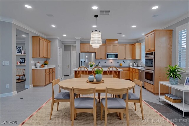 8228 Fulton Ranch St, Las Vegas, NV 89131 - dining room featuring ornamental molding and recessed lighting