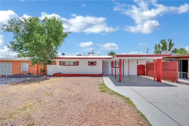 2016 Linden Ave, Las Vegas, NV 89101 - view of front of house with a carport, fence, and driveway