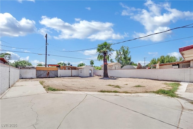 2016 Linden Ave, Las Vegas, NV 89101 - fenced backyard featuring a patio, a storage shed, and an outdoor structure