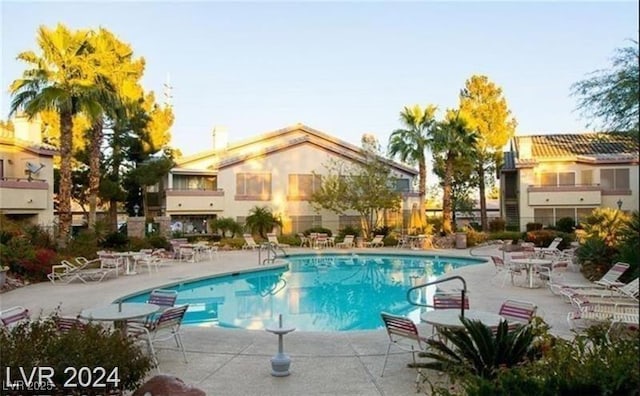 community pool featuring a patio