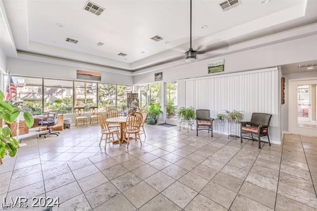 common area featuring a towering ceiling
