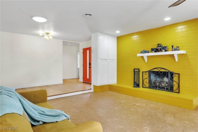 1679 Raindance Way, Las Vegas, NV 89169 - living area with a fireplace, baseboards, and recessed lighting