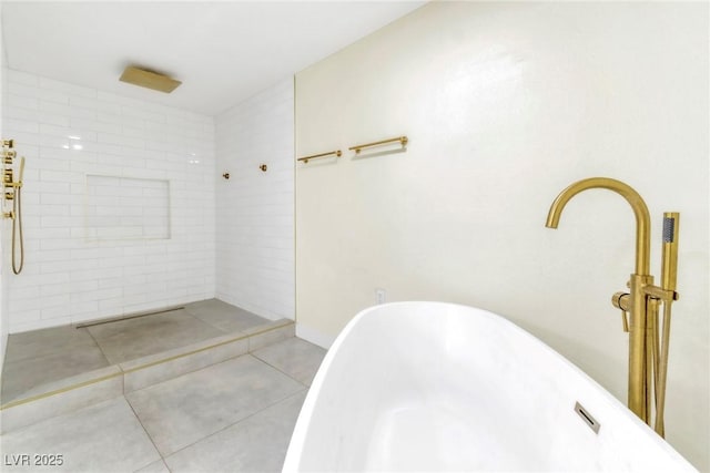 1679 Raindance Way, Las Vegas, NV 89169 - bathroom featuring tile patterned flooring, tiled shower, and a freestanding bath