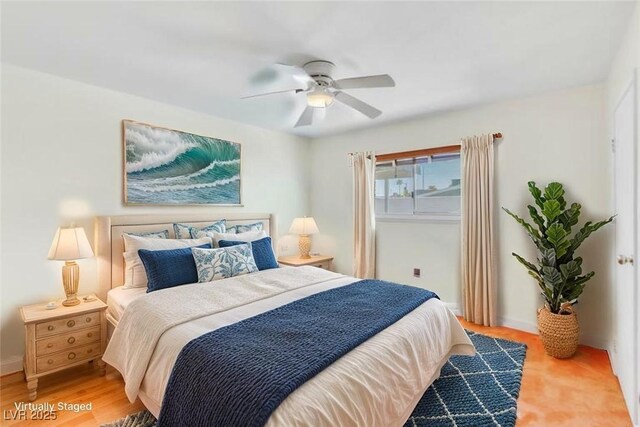 1679 Raindance Way, Las Vegas, NV 89169 - bedroom featuring ceiling fan and baseboards