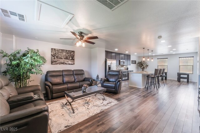 4650 Ranch House Rd Unit 86, North Las Vegas, NV 89031 - living area featuring a ceiling fan, dark wood finished floors, recessed lighting, and baseboards