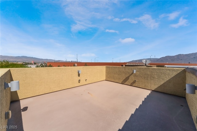 4650 Ranch House Rd Unit 86, North Las Vegas, NV 89031 - view of patio / terrace with a mountain view