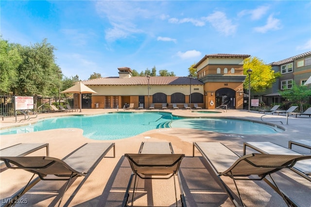 4650 Ranch House Rd Unit 86, North Las Vegas, NV 89031 - community pool featuring fence, a patio area, and a community hot tub