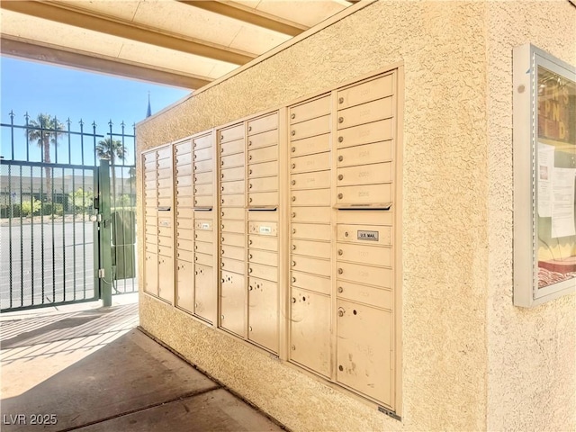 surrounding community featuring mail area and fence