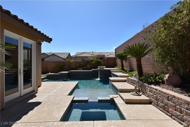 7325 Rustic Crest St, Las Vegas, NV 89149 - view of pool featuring a fenced backyard, french doors, a patio area, and a pool with connected hot tub