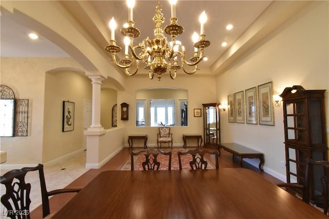 7325 Rustic Crest St, Las Vegas, NV 89149 - tiled dining space with arched walkways, recessed lighting, and a chandelier