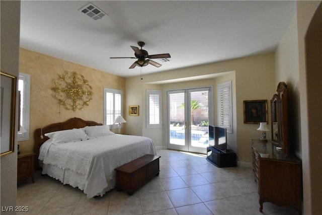 7325 Rustic Crest St, Las Vegas, NV 89149 - bedroom featuring access to exterior, baseboards, ceiling fan, light tile patterned flooring, and french doors