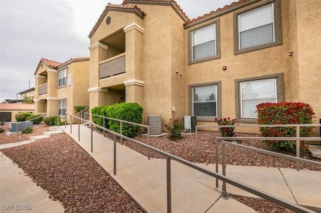 2300 E Silverado Ranch Blvd Unit 1070, Las Vegas, NV 89183 - view of building exterior featuring central air condition unit