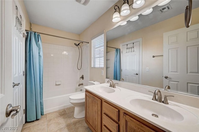 full bath featuring tile patterned floors, shower / bath combination with curtain, double vanity, and toilet