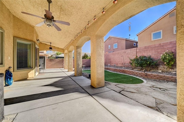 view of patio / terrace with a ceiling fan and a fenced backyard