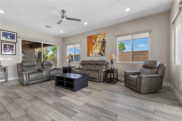 7477 Triple Knot Ct, Las Vegas, NV 89113 - living area with a ceiling fan, light wood-type flooring, recessed lighting, and baseboards