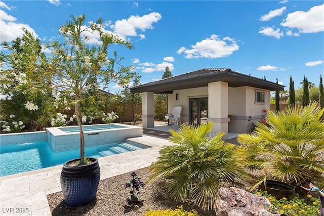 7477 Triple Knot Ct, Las Vegas, NV 89113 - swimming pool featuring an in-ground hot tub, a patio, and french doors